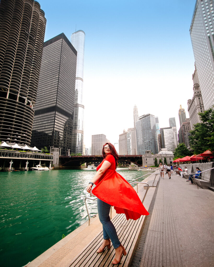 dancing in a red dress by the Chicago riverwalk